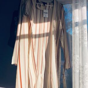 Beige with brown, white, and black stripe